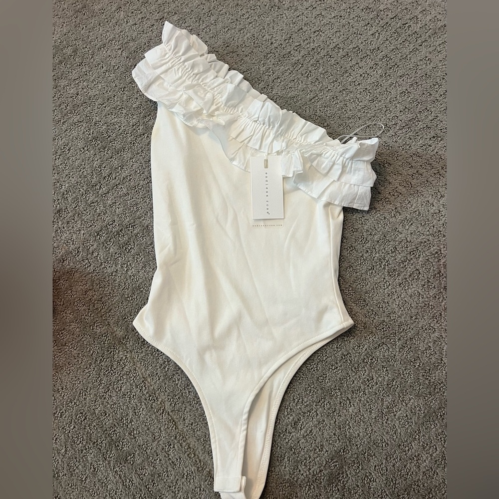 ENDLESS ROSE BODY SUIT NEVER WORN $20